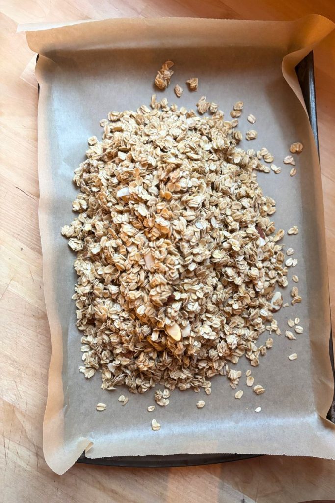 Granola on a parchment lined baking tray
