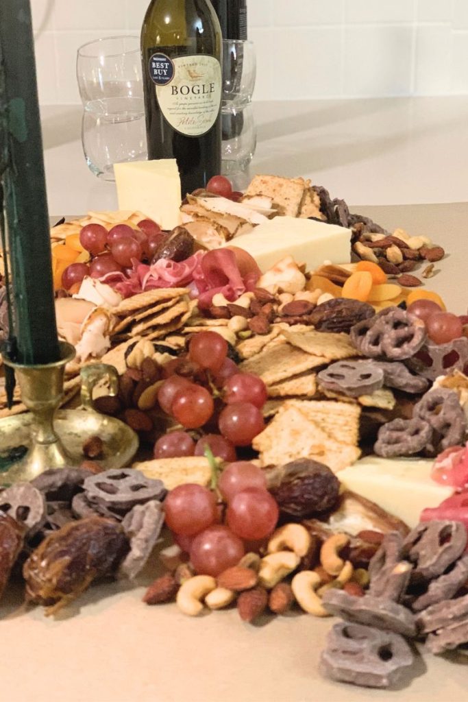 Small scale charcuterie layout with wine